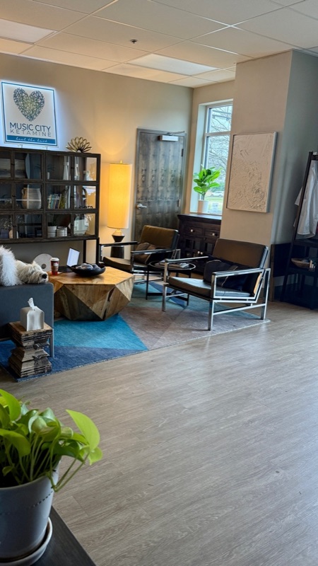 Music City Ketamine lobby with therapy dog and staff member in Franklin Tennessee